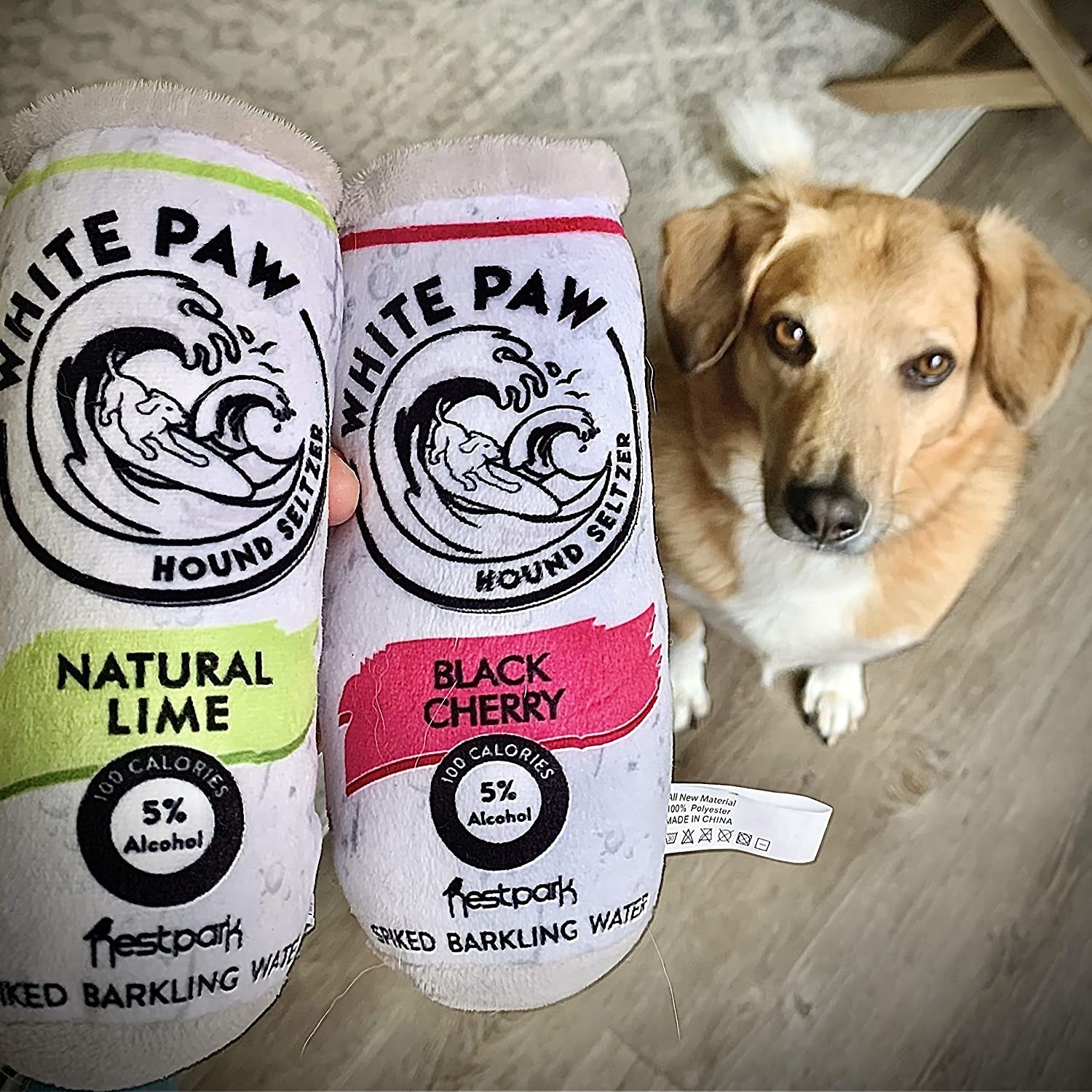 Two stuffed toys modeled after Natural Lime and Cherry White Claws 