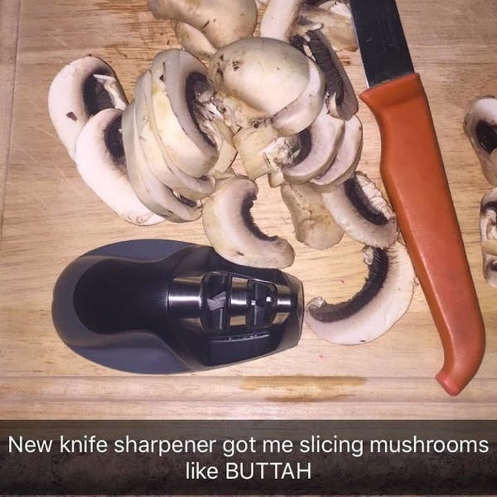 Image of knife sharpener on chopping board with mushrooms and knife