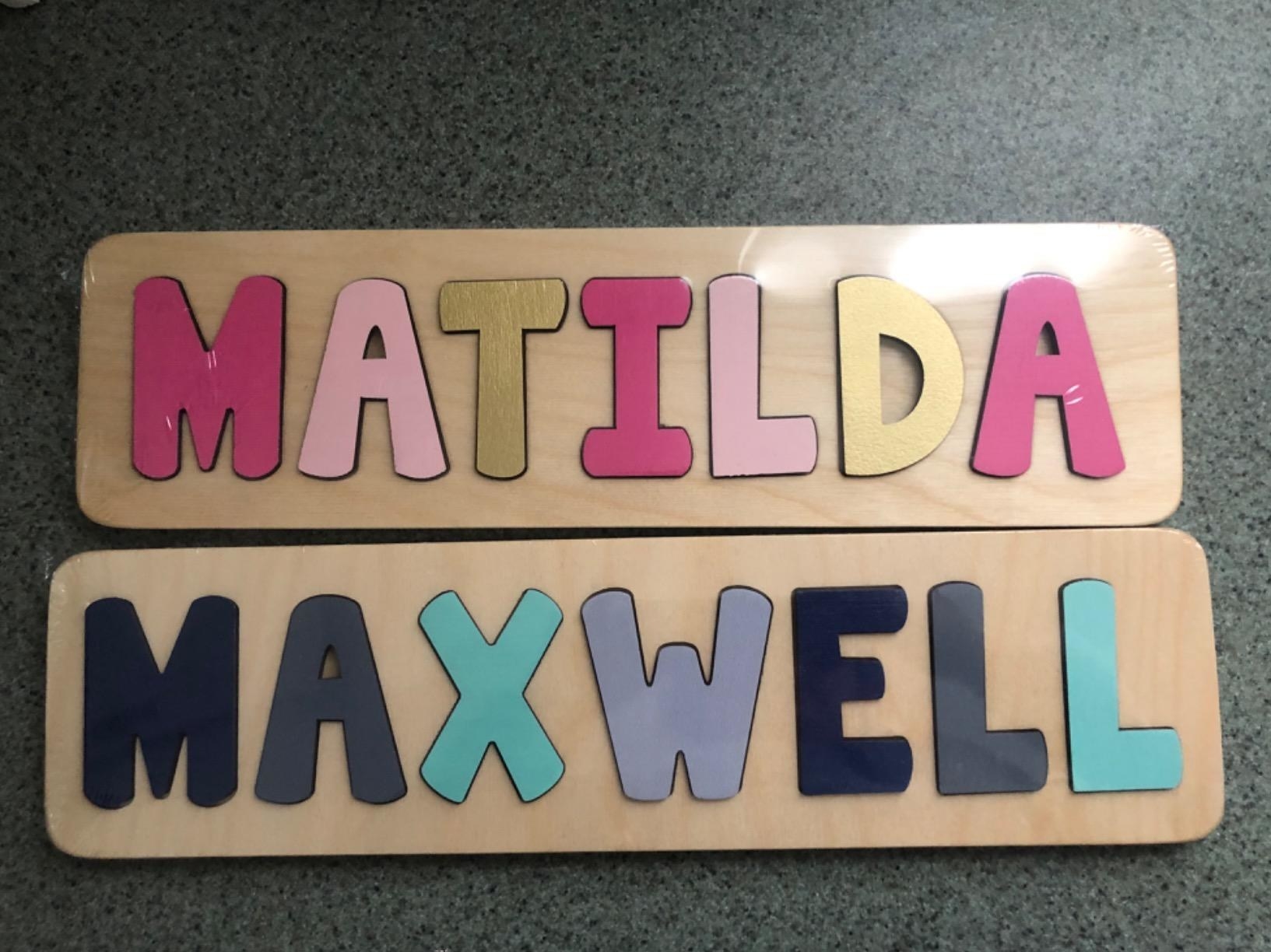 A reviewer showing letter-shaped puzzle pieces with the names Matilda and Maxwell