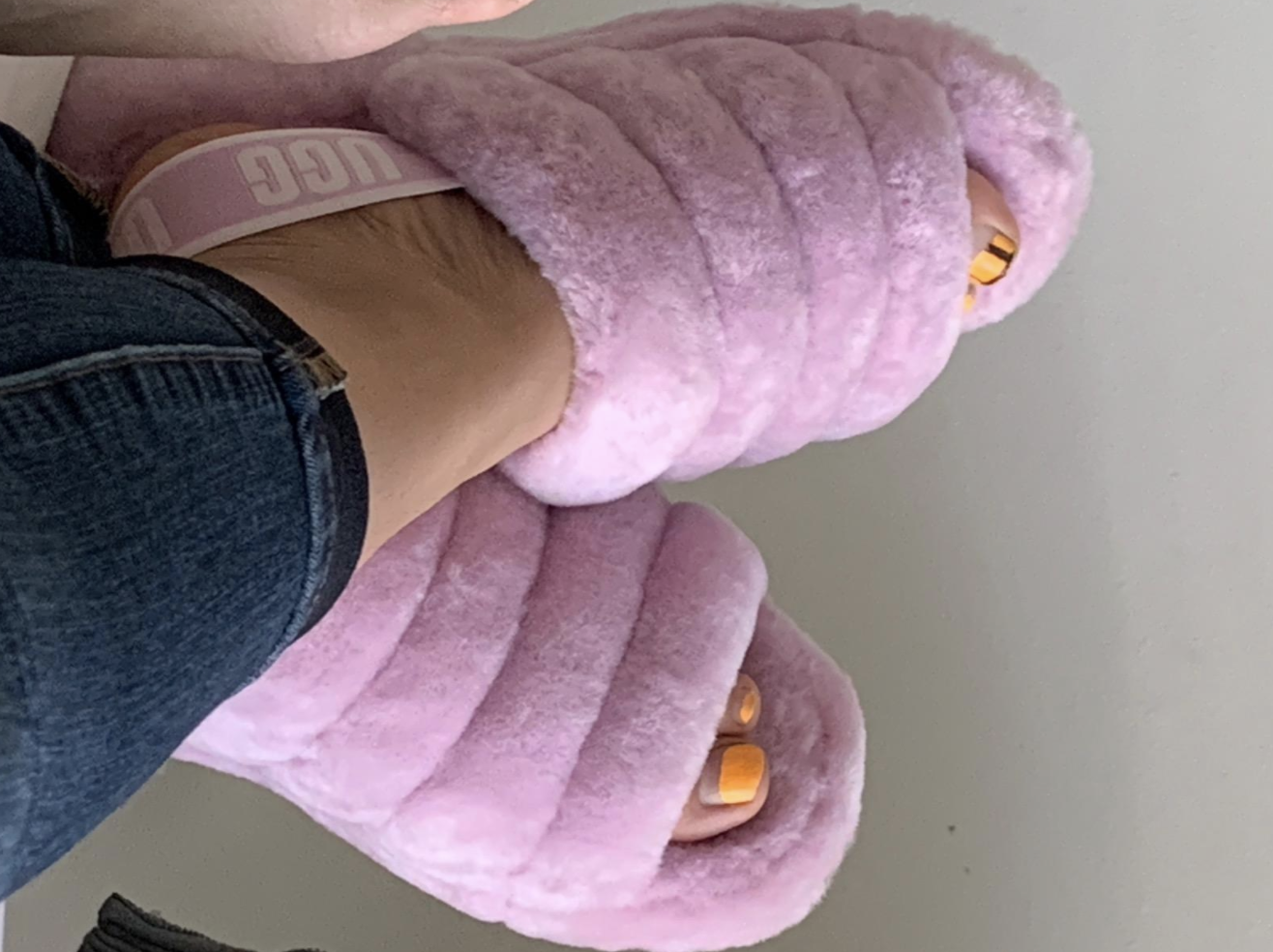 Amazon customer wears UGG slippers in California Aster color