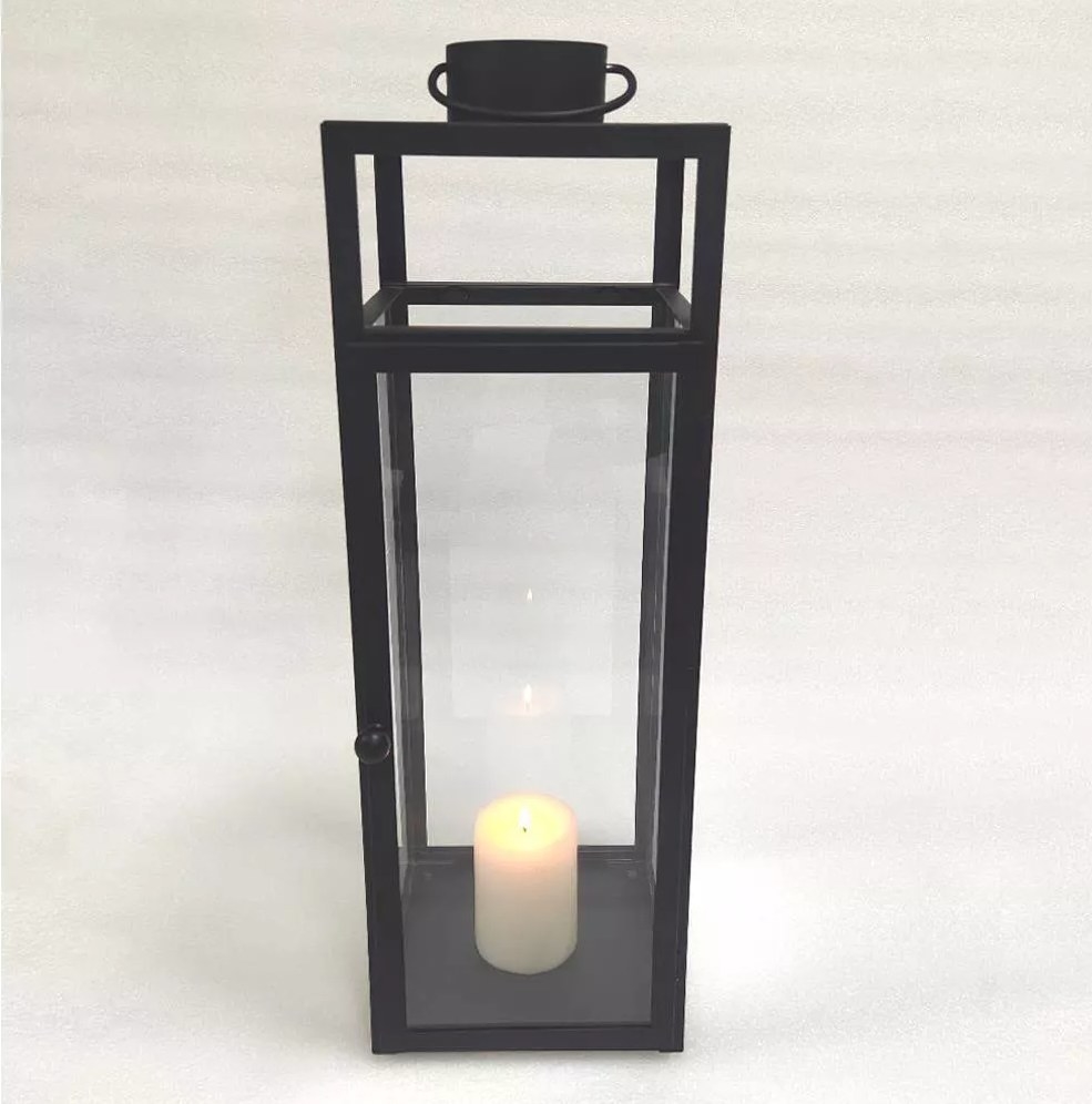 The lantern with a lit candle inside