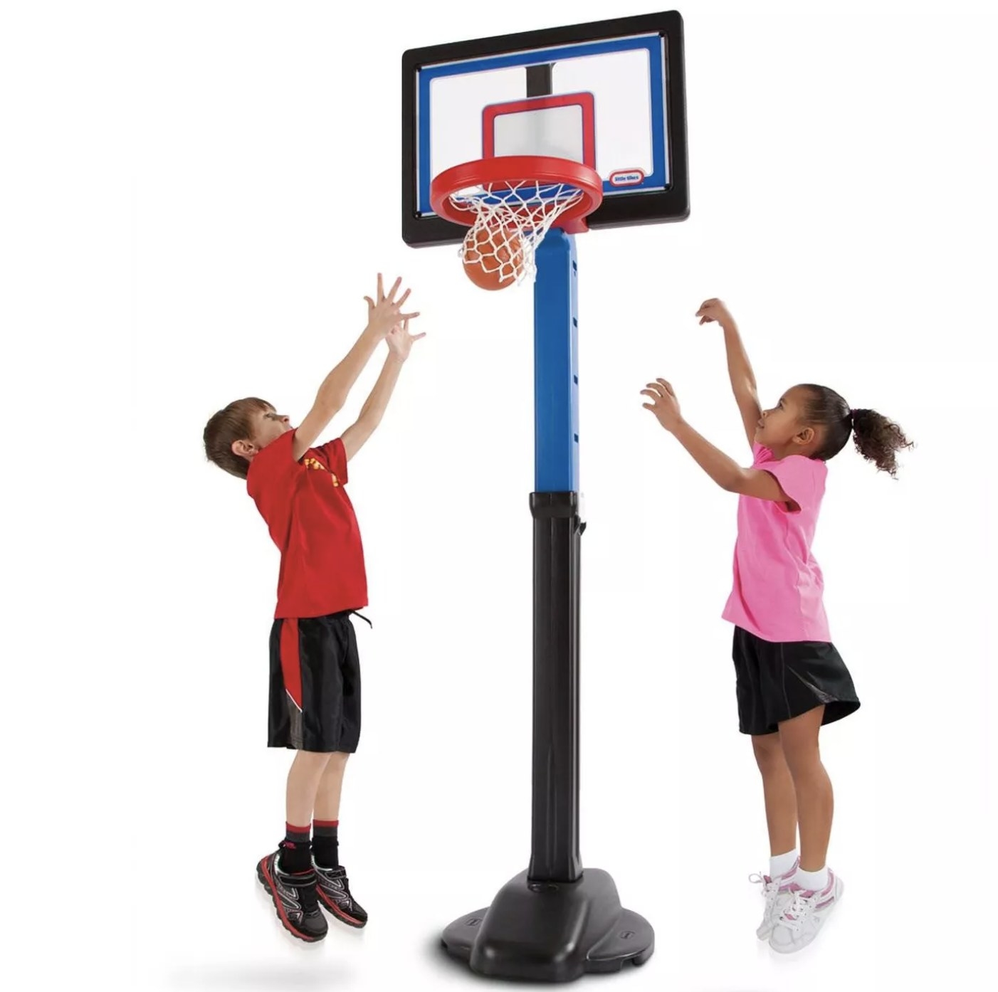 Two children playing basketball