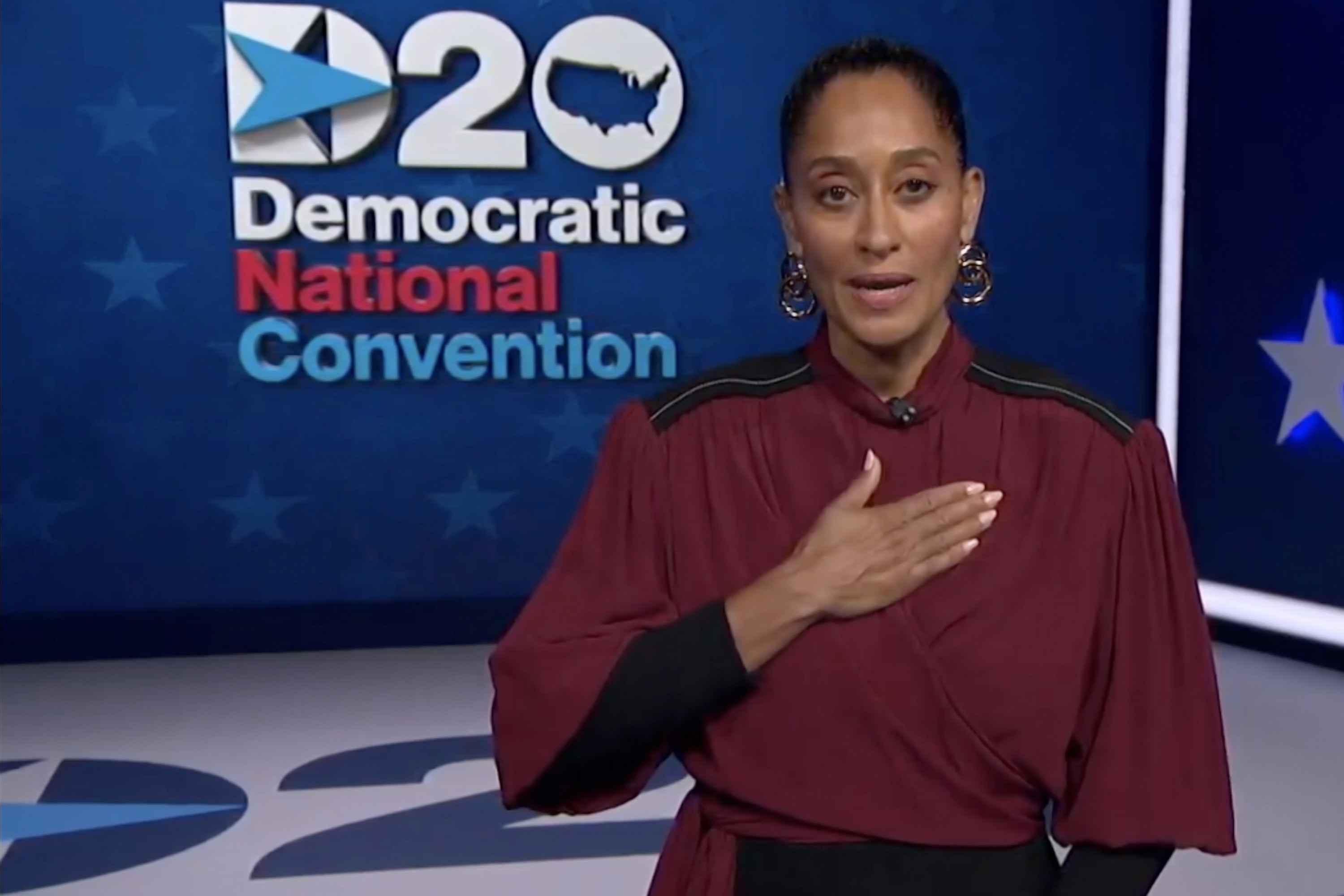 Tracee with her hand over her heart while speaking at the 2020 Democratic National Convention