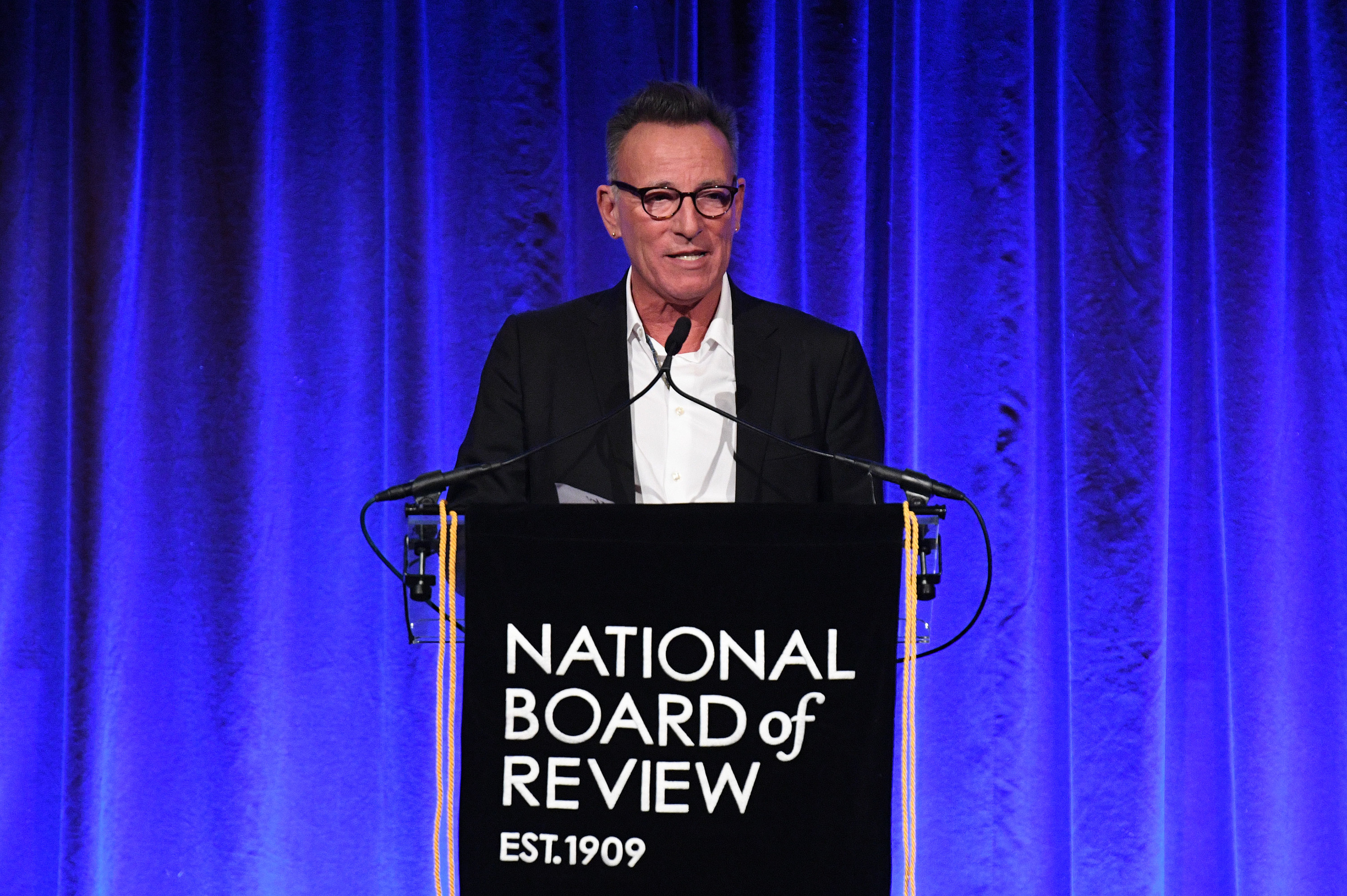 Bruce speaking at a National Board of Review event