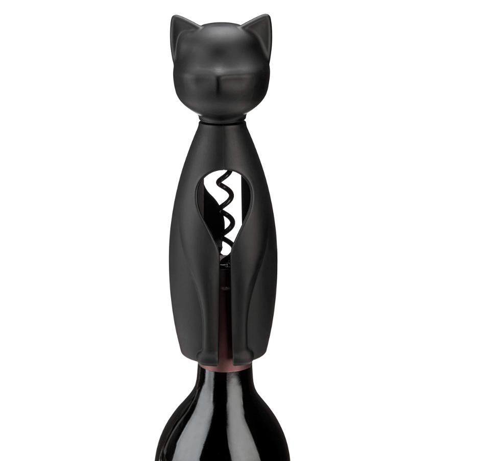 A black cat-shaped corkscrew wine opener perched on a bottle 