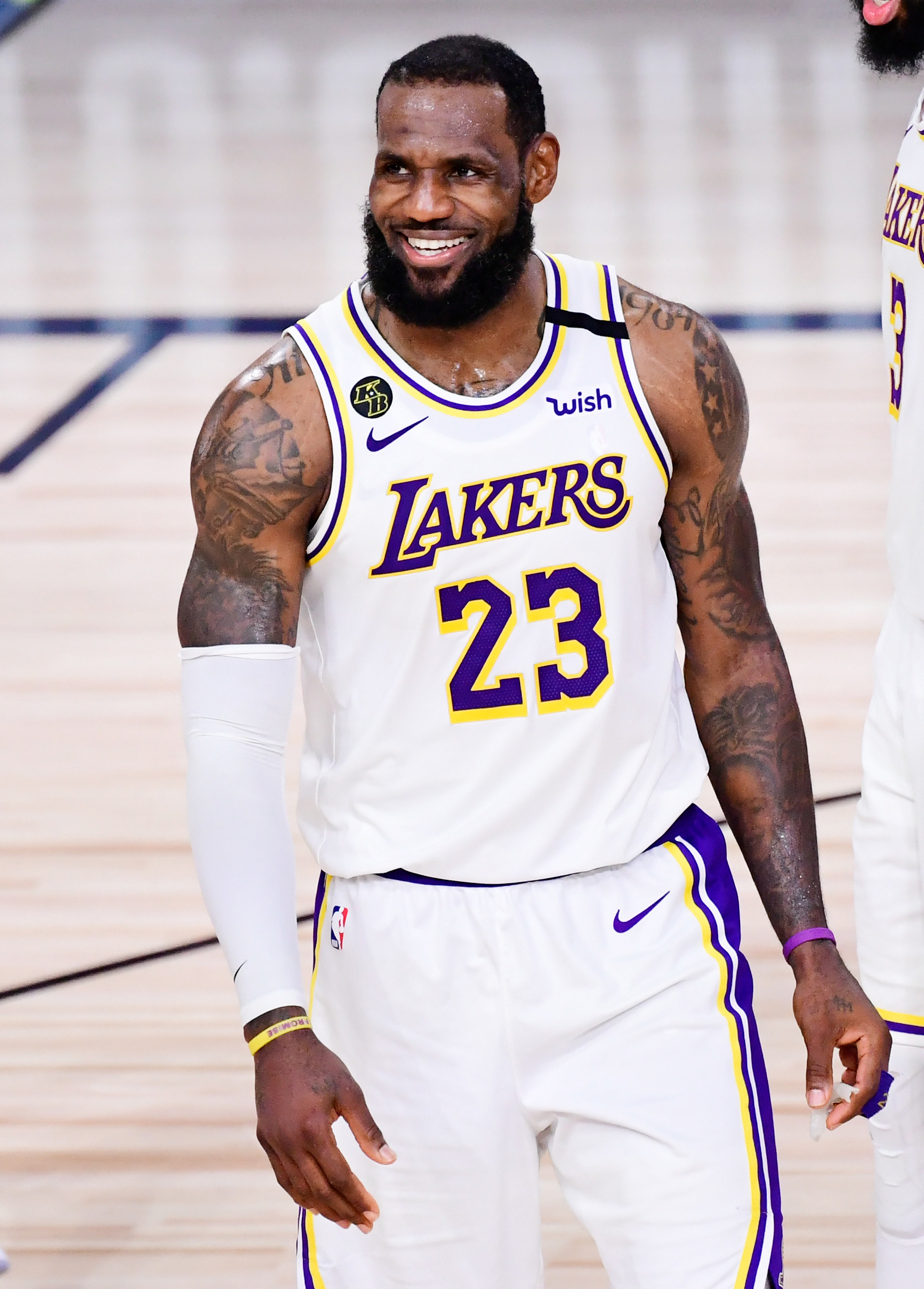 LA Lakers player LeBron smiling on the basketball court