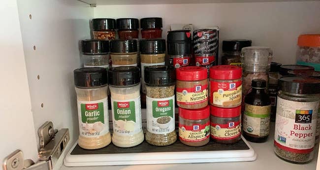 A reviewer's photo of the pantry organizer used with spices