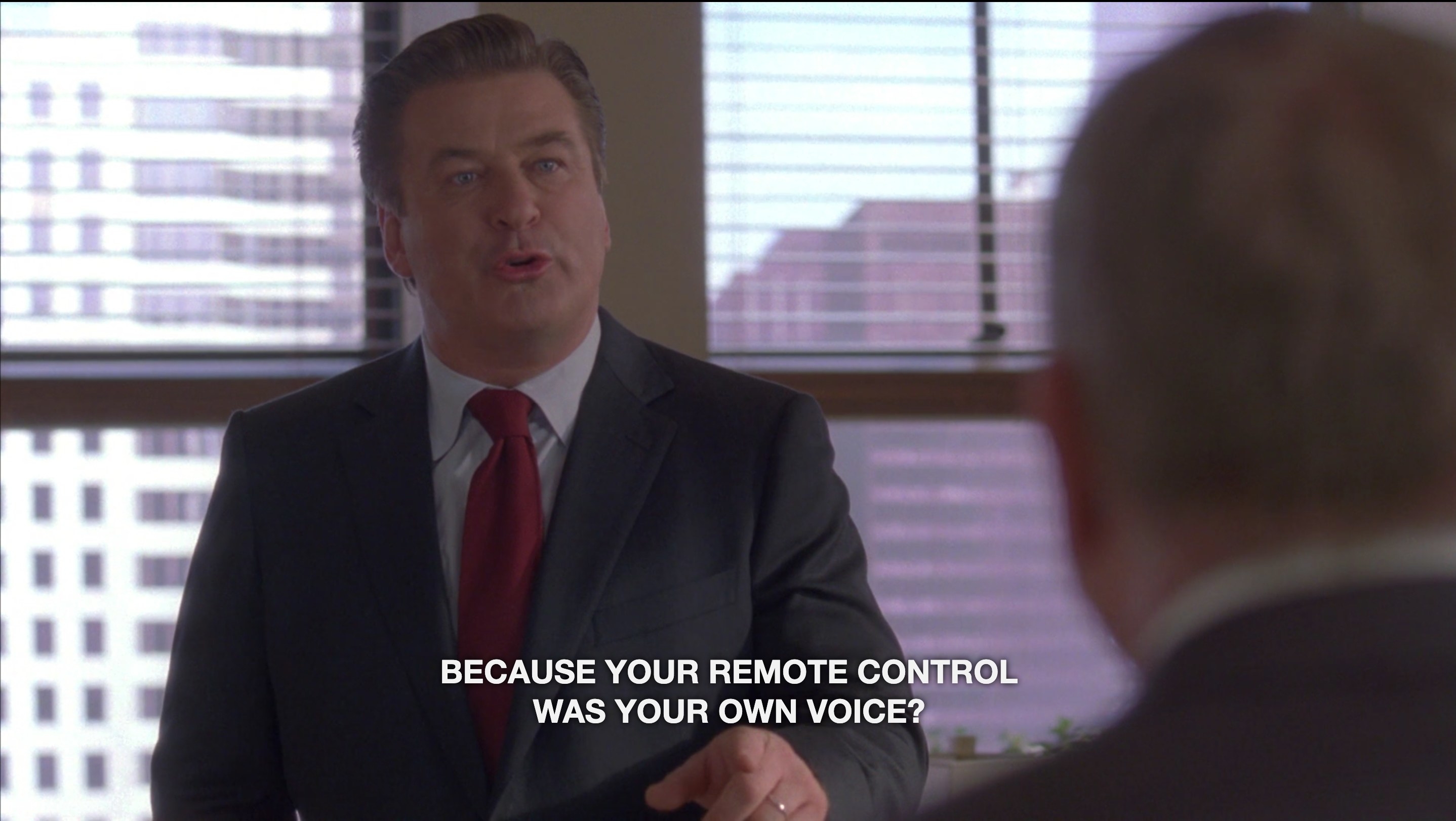 A man in a suit with the caption text "Because your remote control was your own voice?"