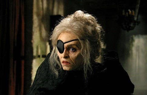 An old witch with an eye patch on