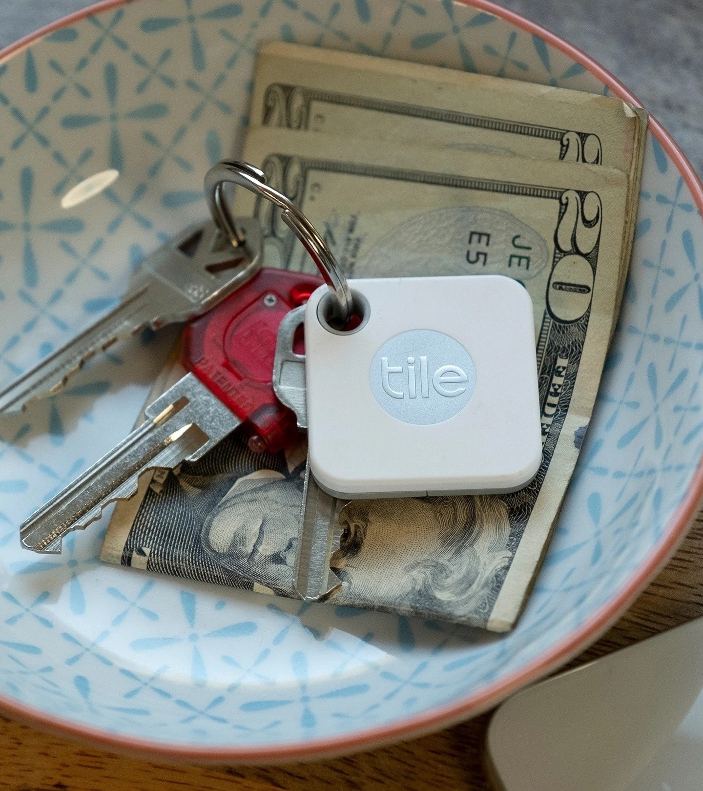 the Tile attacked to a ring of keys in a bowl