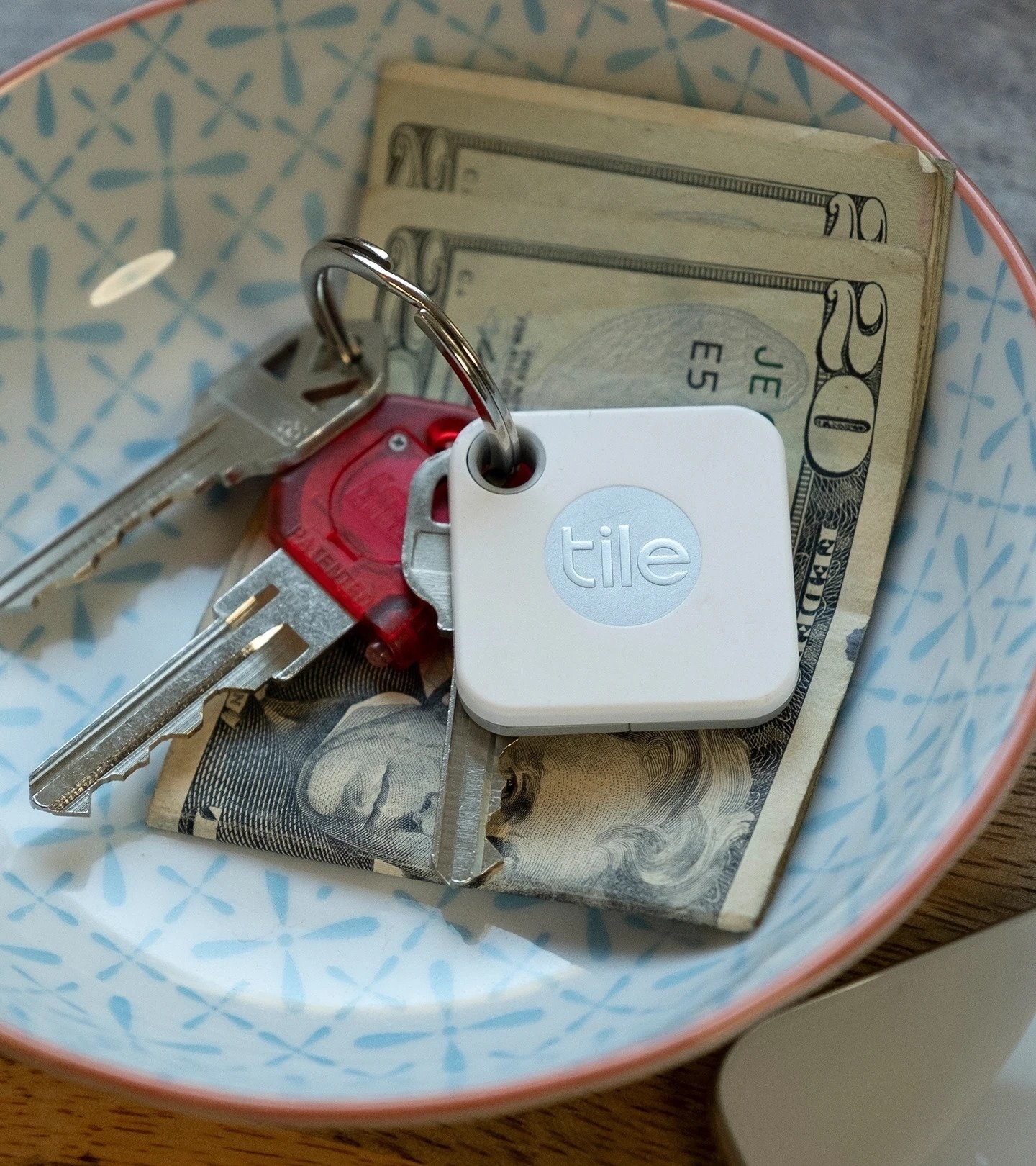 the Tile attacked to a ring of keys in a bowl 