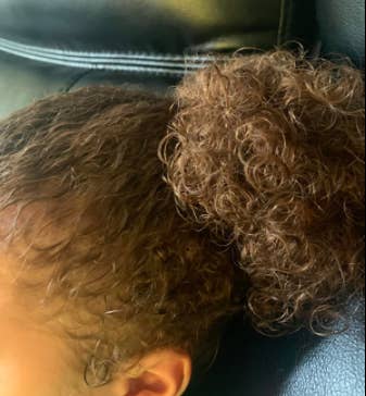 reviewer's pic of kid's super curly hair