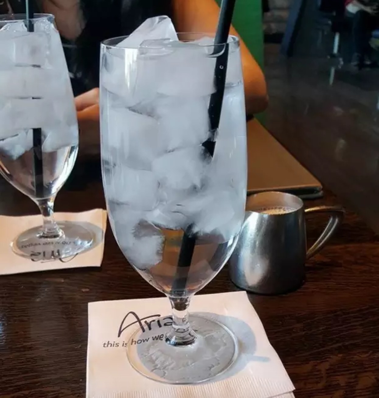 Picture of a glass of water filled with ice cubes