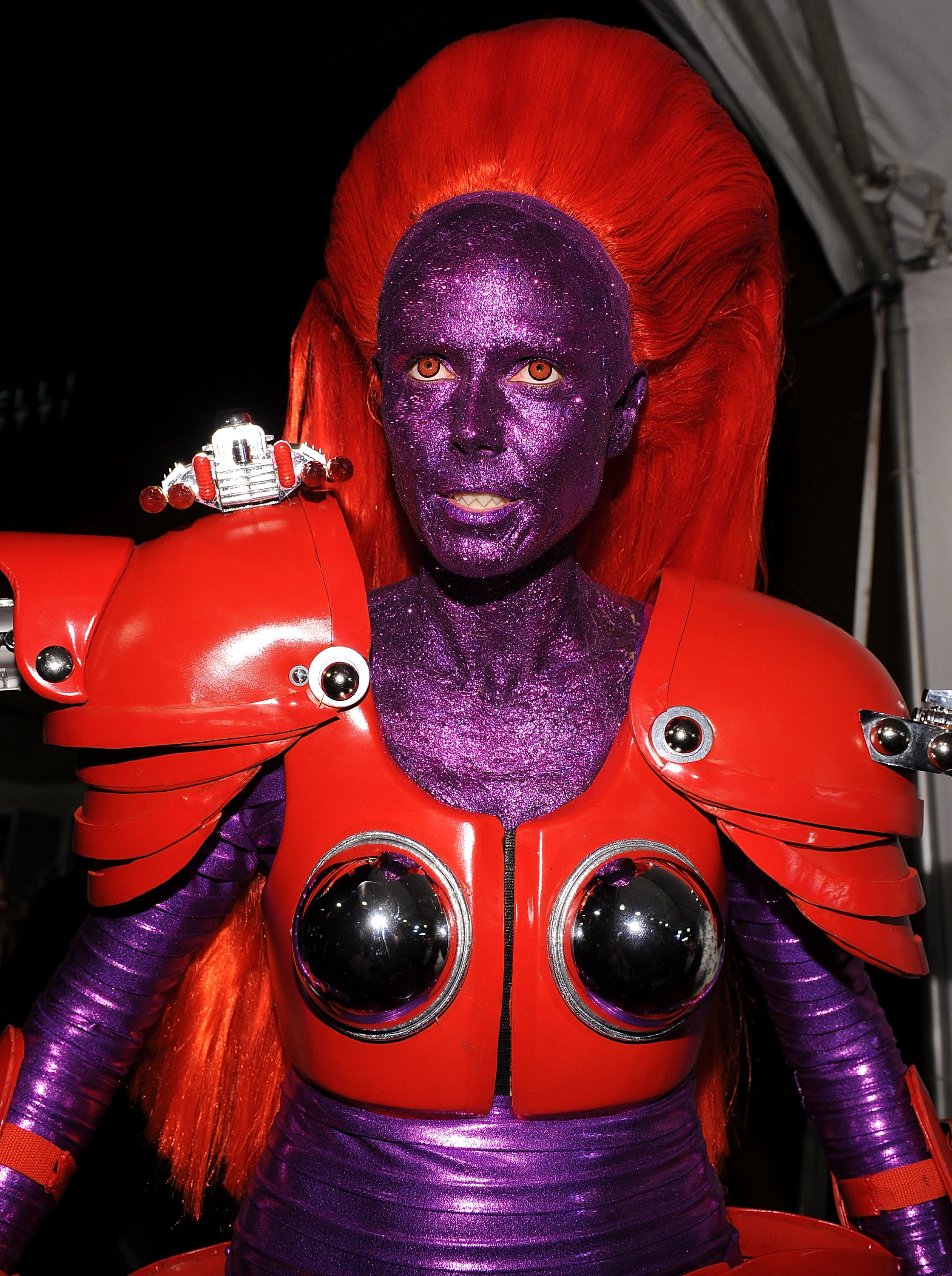 Heidi Klum dressed as a robot transformer in purple and red. 