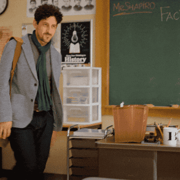 Adam Shapiro says, &quot;Good morning, you young brilliant minds,&quot; as he walks into his classroom in Never Have I Ever