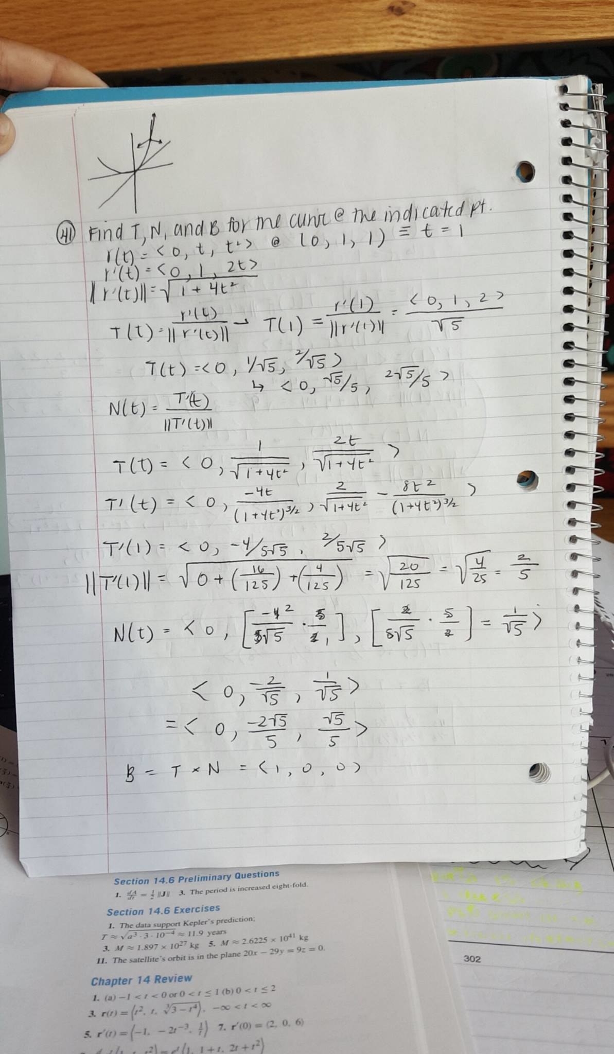 A student holds up their notebook, showing their handwritten math homework