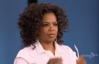 Oprah puts on sunglasses with the words &quot;Deal with it&quot; over her 