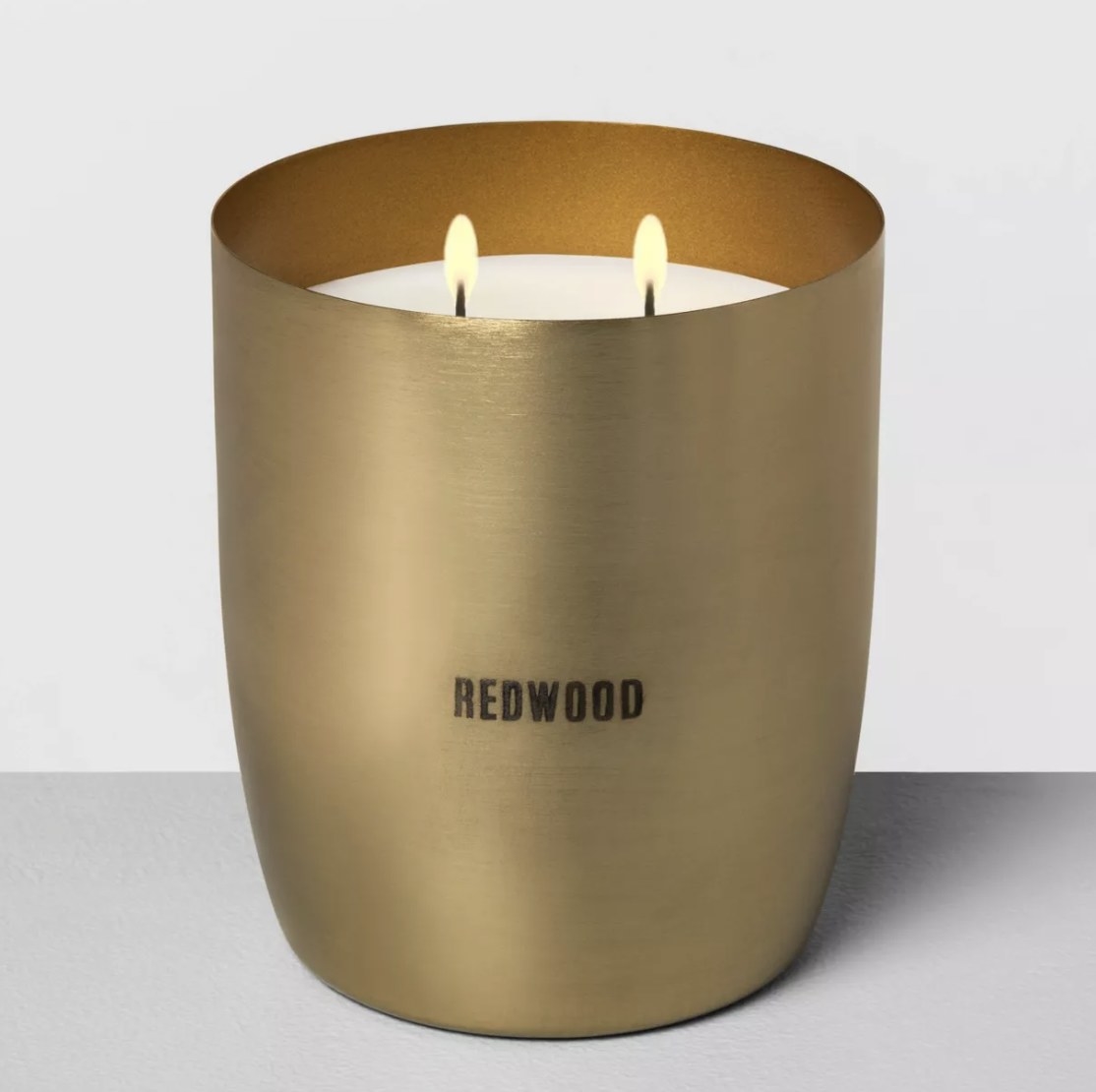 The candle in the redwood scent