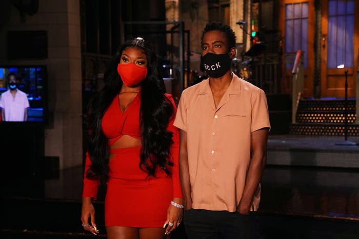 Megan Thee Stallion and Chris Rock wearing masks