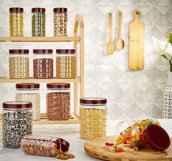 The jars displayed with food in them.