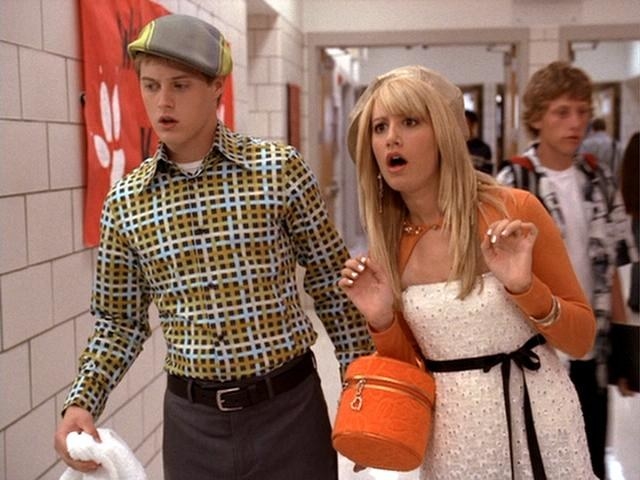 Sharpay and Evan in the school hallway looking bewildered at the callback list