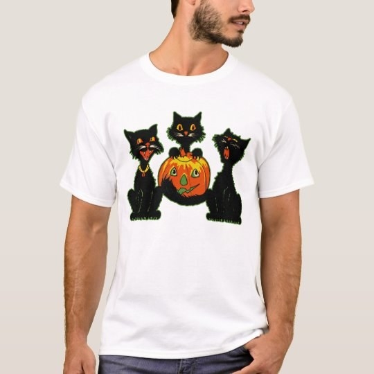 a model wearing a white tee with three black cats and a pumpkin