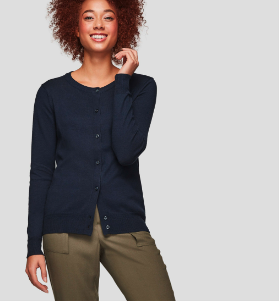 A model wearing a navy button-up cardigan