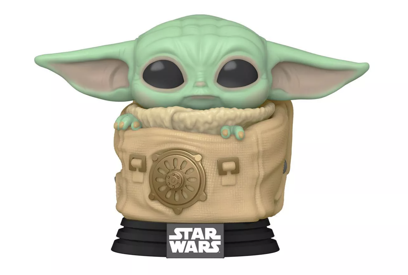 baby yoda in a tiny pouch
