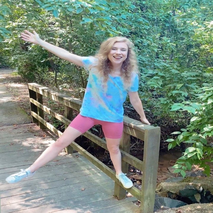 BuzzFeed Editor, Emma Lord, wearing the bike shorts in pink