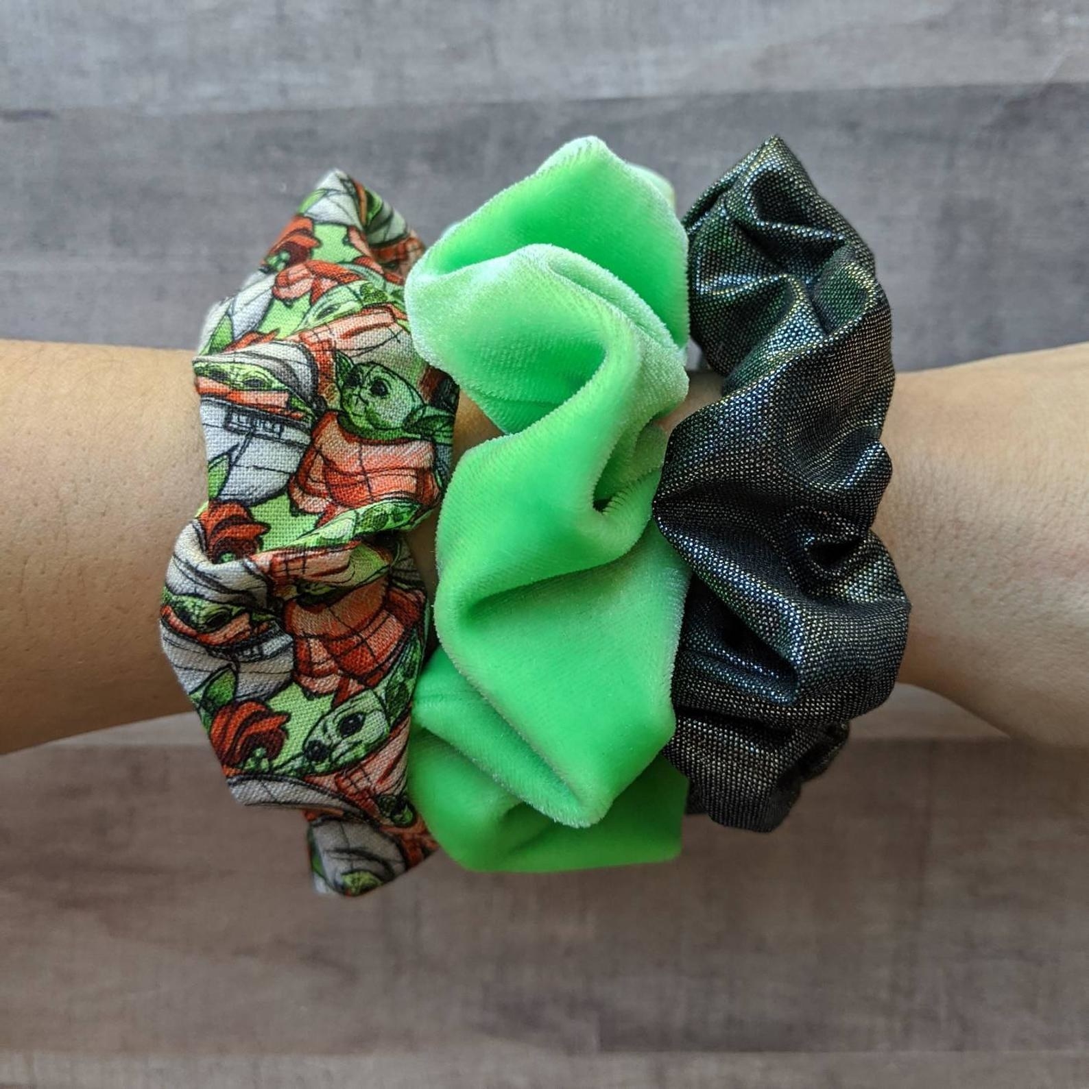 three scrunchies on arm