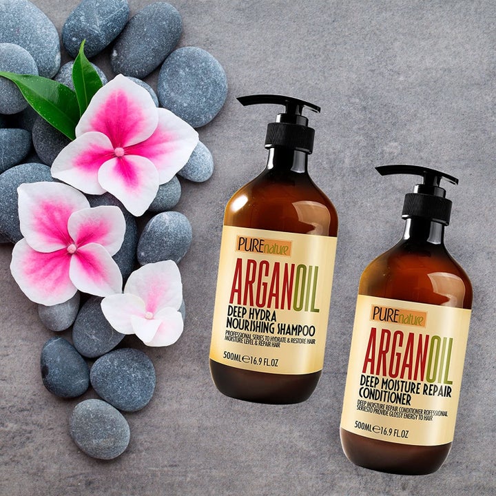 The Moroccan Argan Oil Shampoo and Conditioner overlayed on a floral graphic