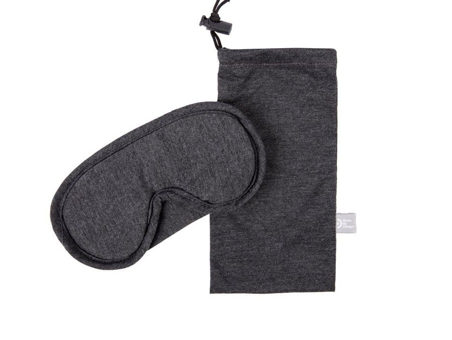 The sleep mask in grey with its matching carrying case