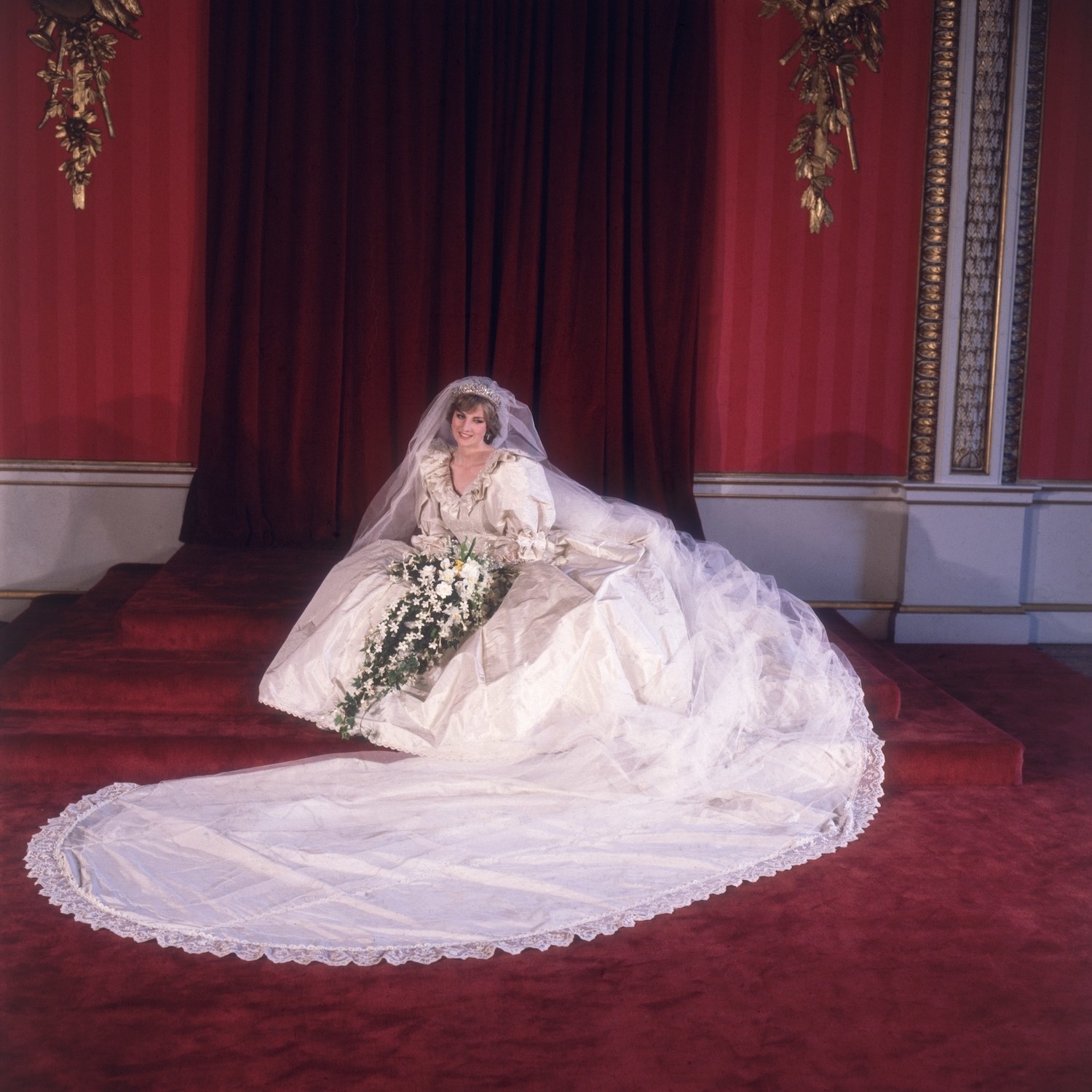 Formal portrait of Lady Diana Spencer (1961 - 1997) in her wedding dress designed by David and Elizabeth Emanuel. 