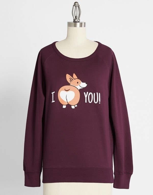 The maroon sweater with the &quot;I heart you&quot; text, the corgi butt has the heart drawn on it