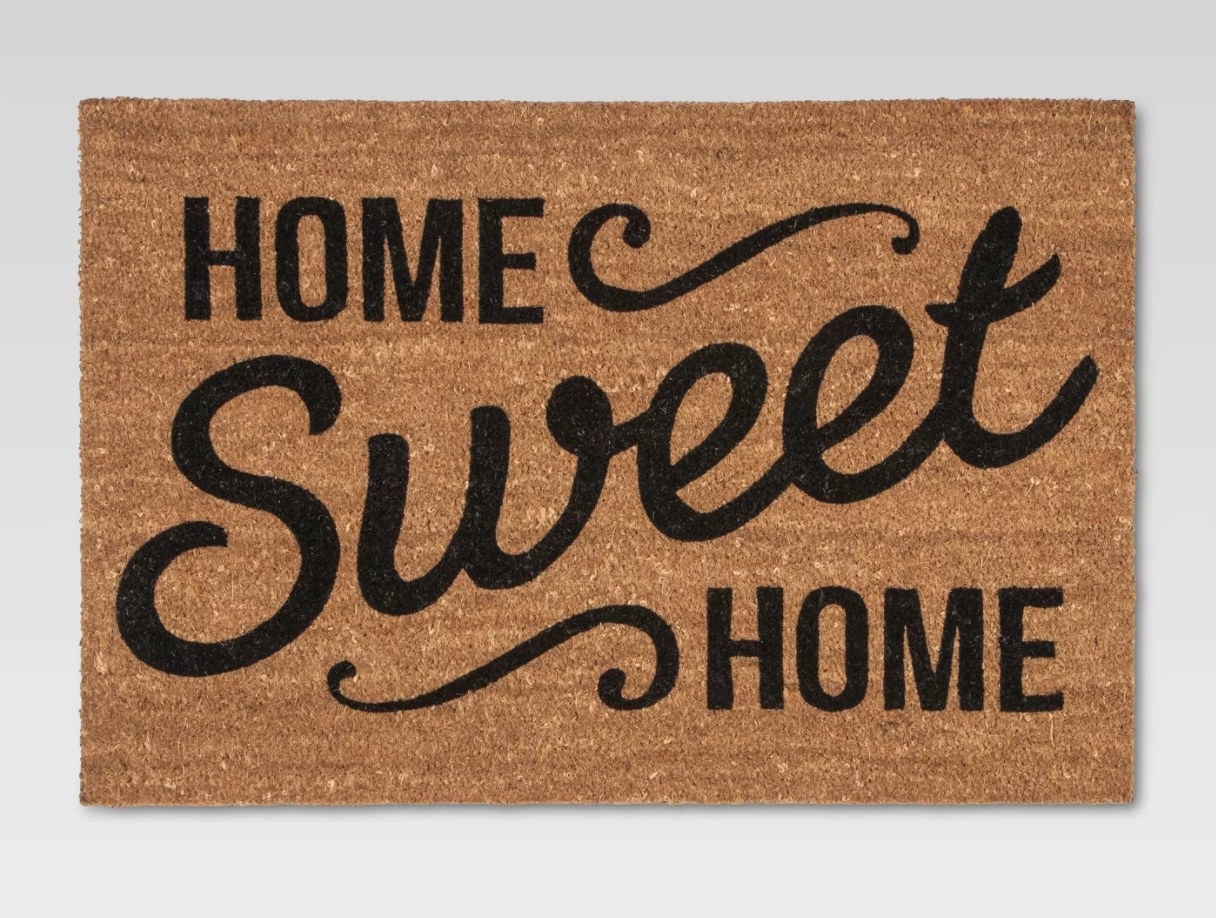 Brown doormat with the words &quot;Home Sweet Home&quot; written across