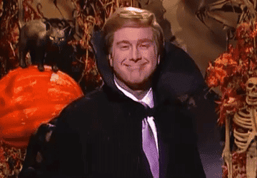 a gif of an snl character a donald trump in a vampire costume