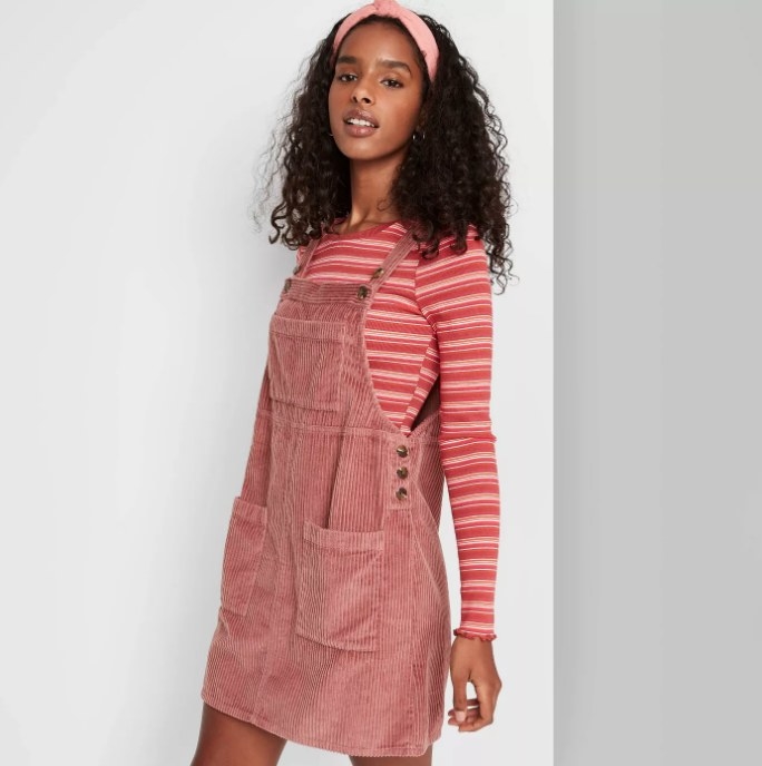 Pink overall dress with stripped long sleeve