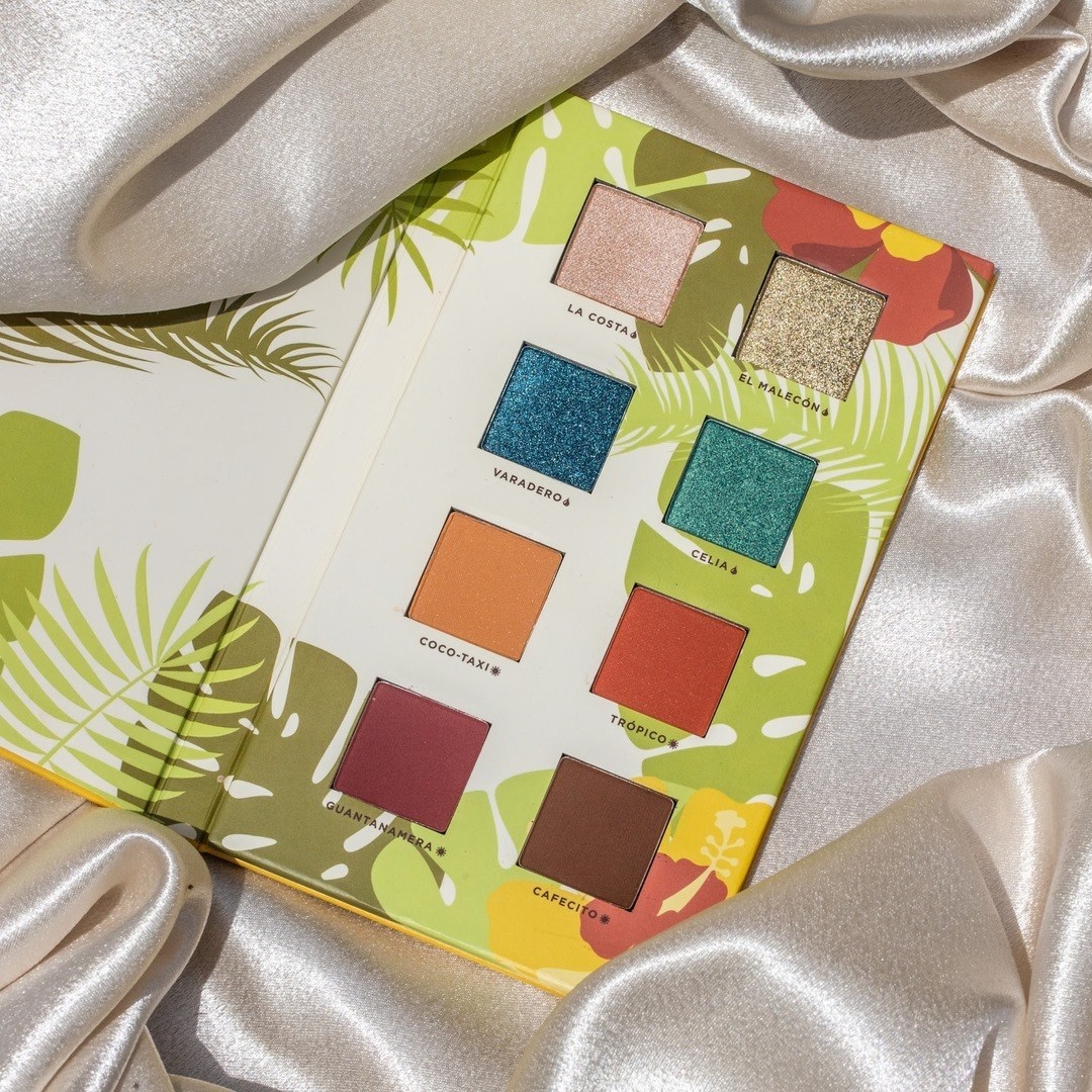 Alamar eyeshadow palette opened on silk background