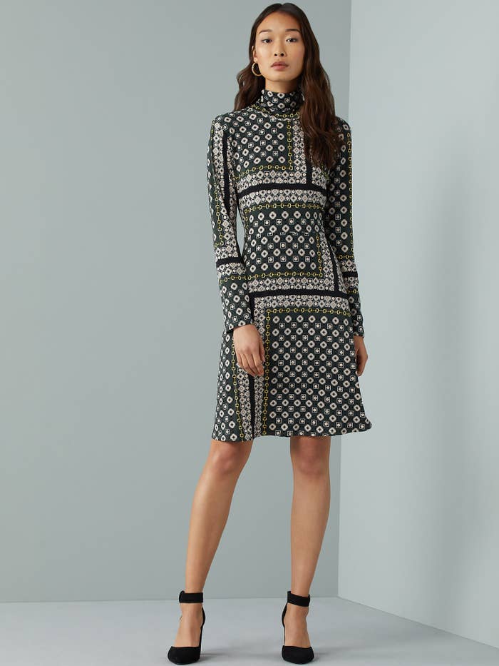 The black and white patterned turtleneck dress