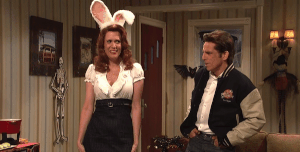 a gif of kristen wiig shaking her butt with a bunny tail on it