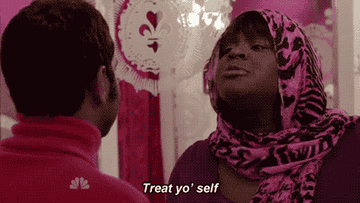 Aziz Ansari and Retta as Tom and Donna saying, &quot;Treat yo&#x27; self&quot; on Parks and Rec