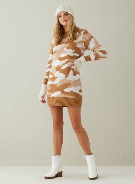The white and tan camo sweater dress