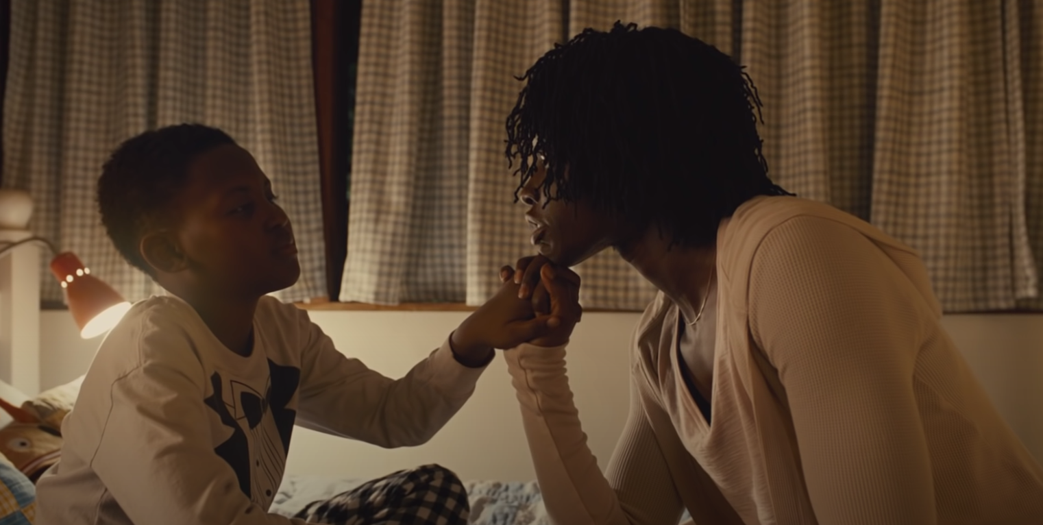 Adelaide talks to her son, Jason, while putting him to bed