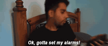 Harjit Bhandal laying in bed saying, &quot;Ok, gotta set my alarms,&quot; and tapping over eight alarms on his phone