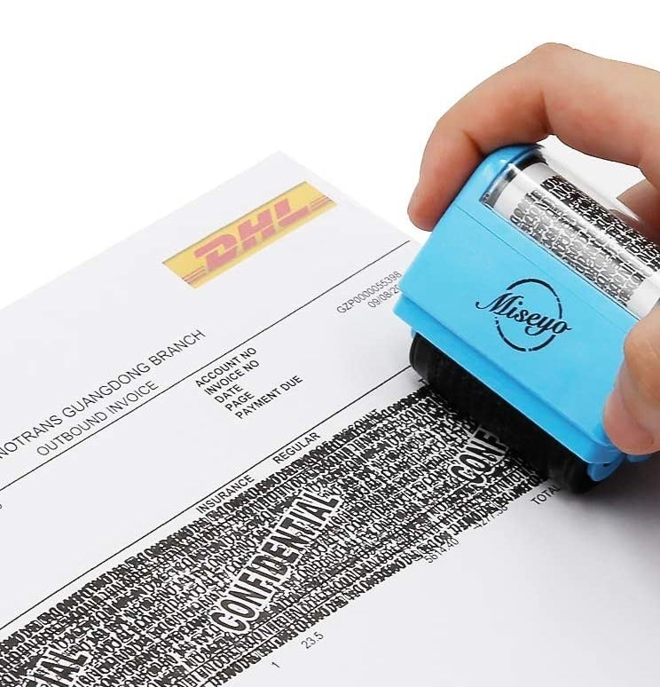 A person using the roller on a DHL invoice