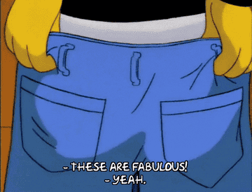 gif of a character from the simpsons trying on jeans saying &quot;these are fabulous&quot; while a gang around him says &quot;yeah&quot;