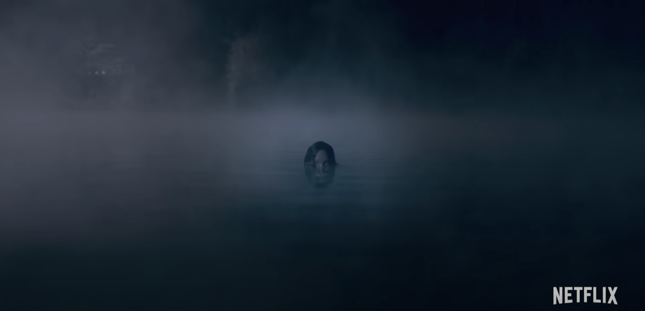 A woman in a creepy lake