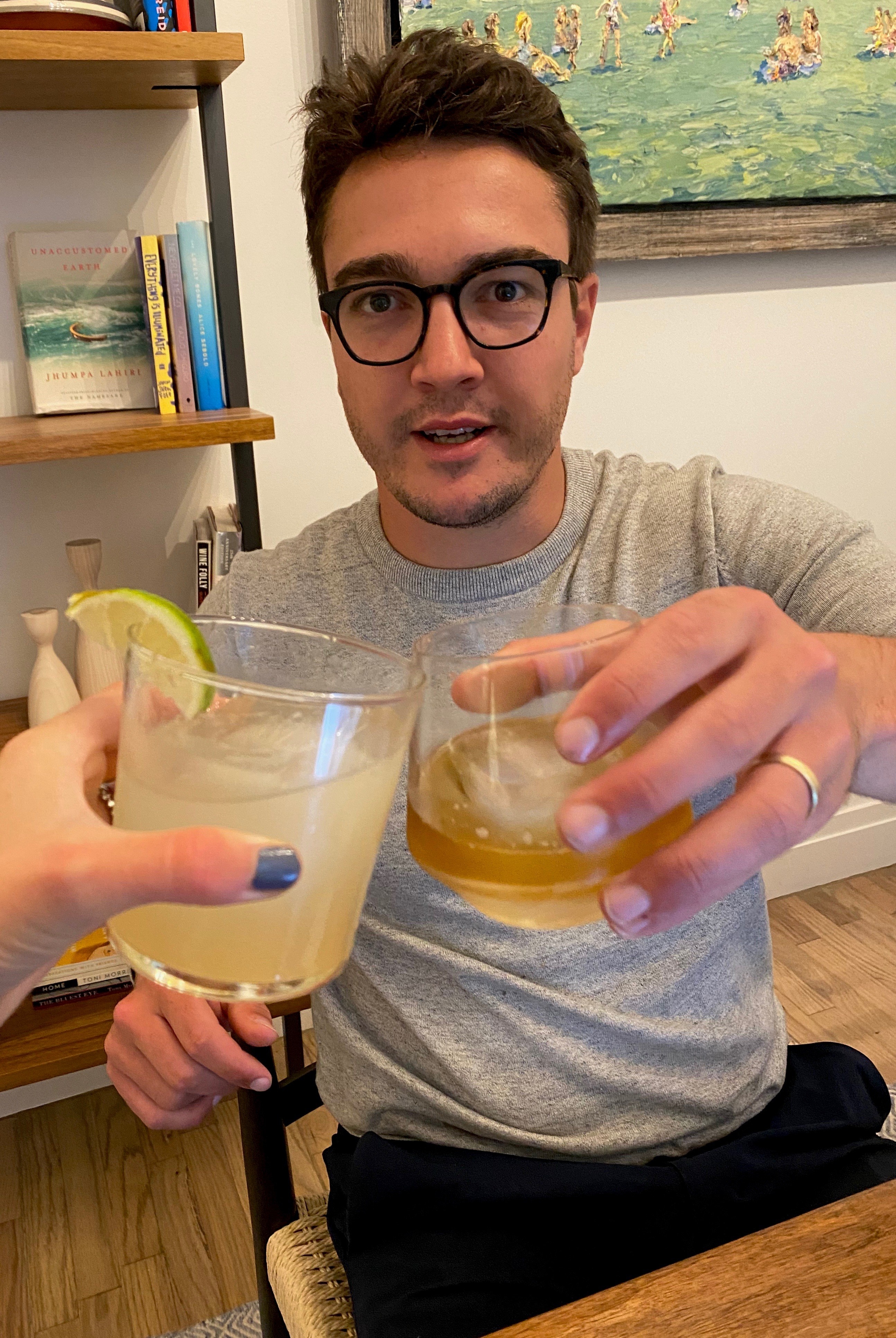 My husband and I cheers-ing with our Bartesian cocktails.