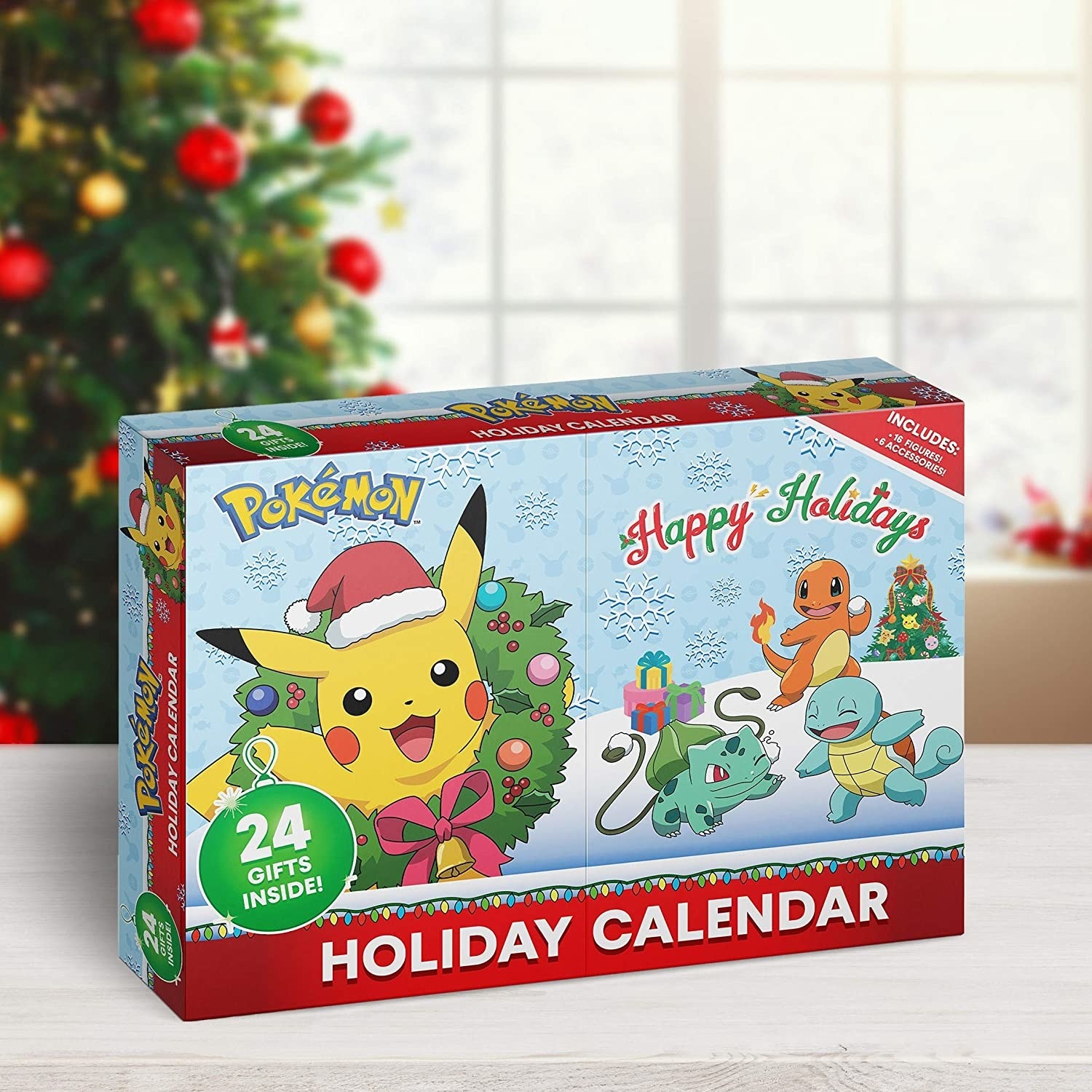 the holiday calendar box with pikachu wearing a santa hat inside a wreath on one side and happy holidays written on the other with squirtle, charmander, and bulbasaur