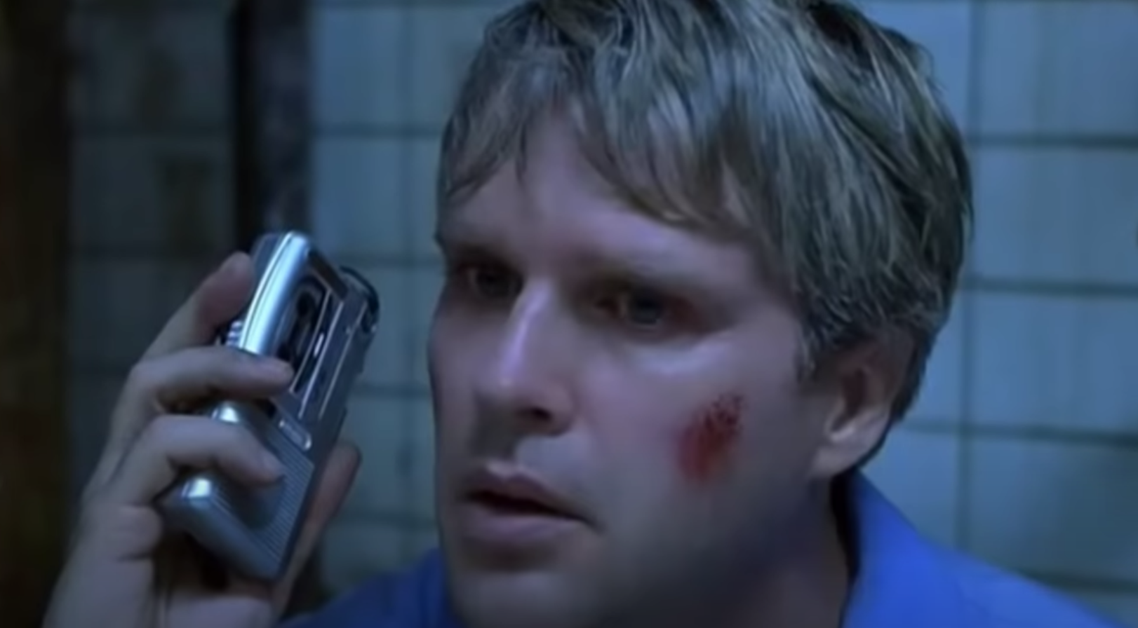 Adam listening to to a tape in "Saw"